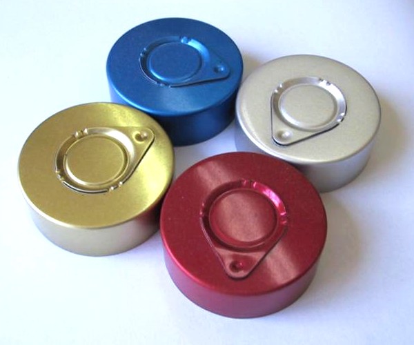 Capsule 32mm à opercule ovoïde.
